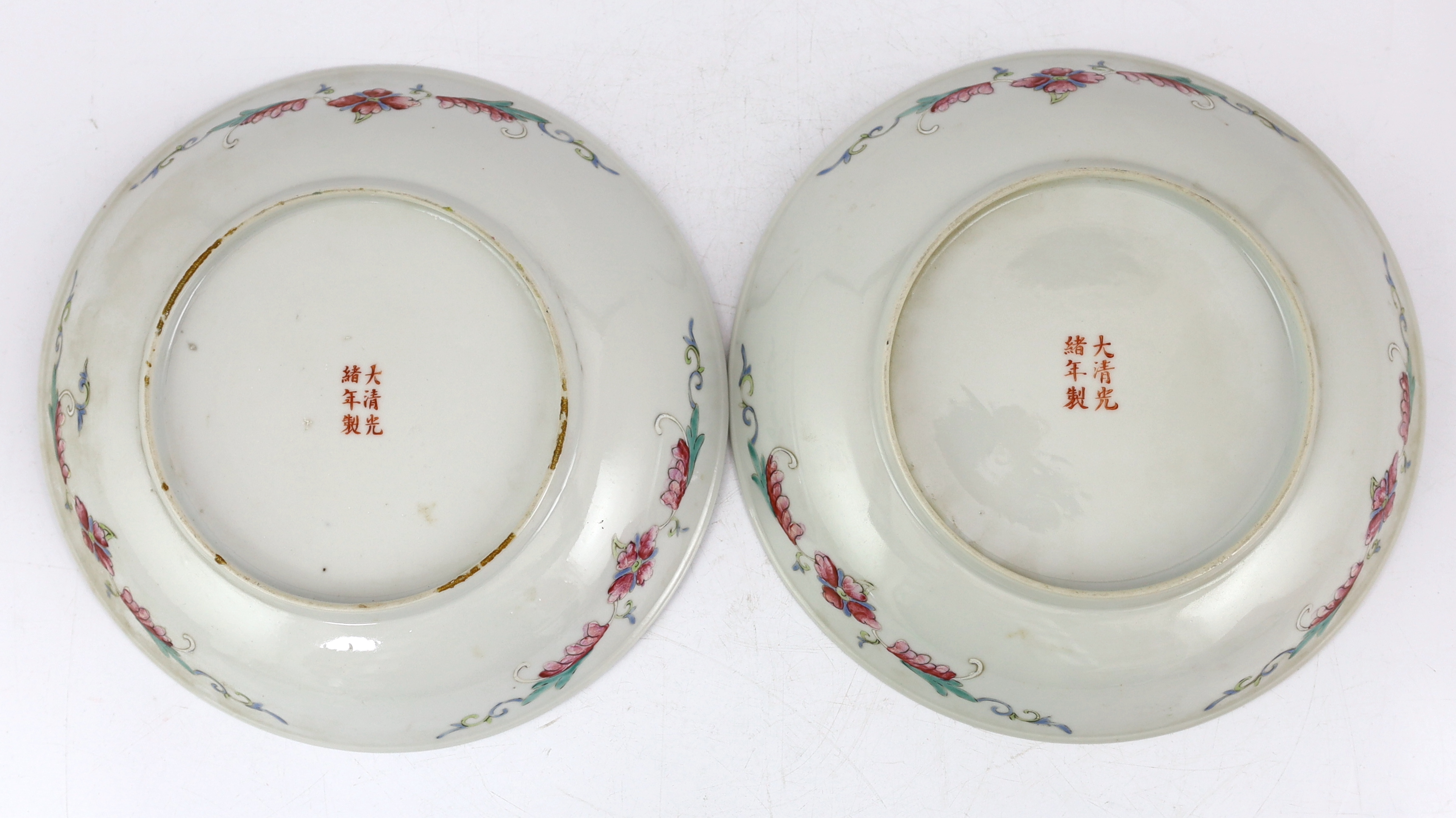 A pair of Chinese yellow ground medallion saucer dishes, Guangxu six character marks, early 20th century, hairline crack to one dish